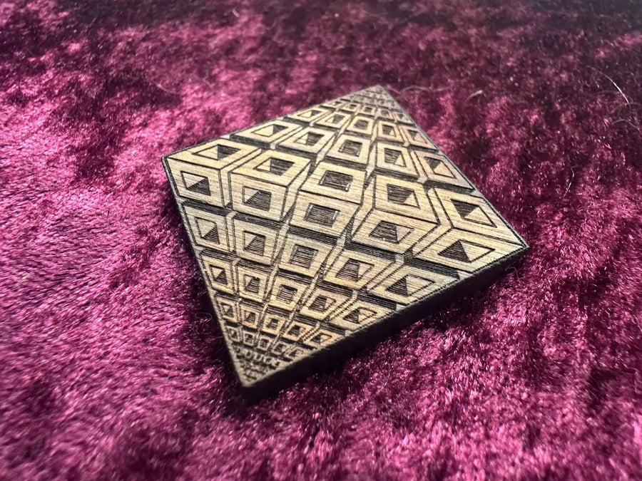 Isometric nested-cube pin in Royal Caribbean Chechen hardwood