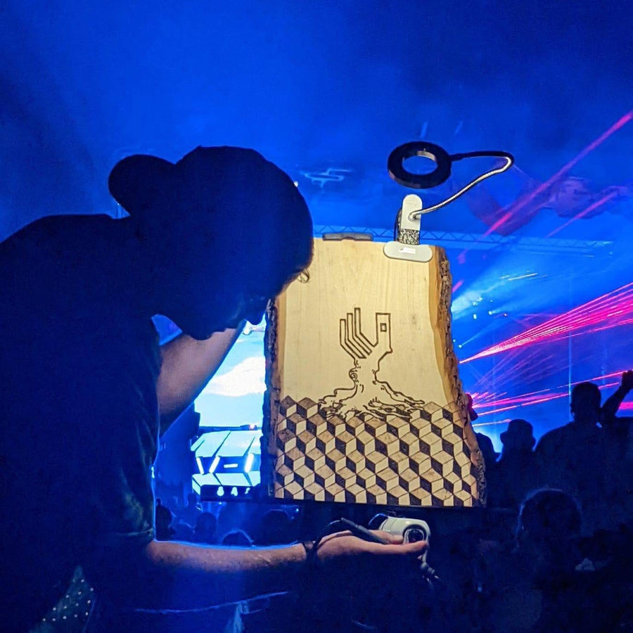 Live-edge slab with a burned tree and cube pattern